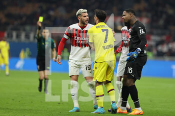 2022-04-04 - Riccardo Orsolini of Bologna FC discusses with Theo Hernandez of AC Milan and Mike Maignan of AC Milan during the Serie A 2021/22 football match between AC Milan and Bologna FC at Giuseppe Meazza Stadium, Milan, Italy on April 04, 2022 - AC MILAN VS BOLOGNA FC - ITALIAN SERIE A - SOCCER