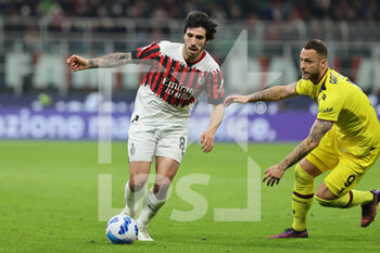 2022-04-04 - Sandro Tonali of AC Milan competes for the ball with Marko Arnautovic of Bologna FC during the Serie A 2021/22 football match between AC Milan and Bologna FC at Giuseppe Meazza Stadium, Milan, Italy on April 04, 2022 - AC MILAN VS BOLOGNA FC - ITALIAN SERIE A - SOCCER