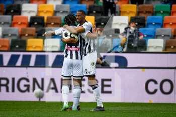 2022-04-03 - Udinese's Beto Betuncal celebrates after scoring a goal 5-1 with Udinese's Brandon Soppy - UDINESE CALCIO VS CAGLIARI CALCIO - ITALIAN SERIE A - SOCCER