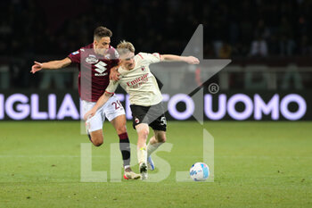 2022-04-10 - Alexis Saelemaekers (AC Milan) vs Samuele Ricci (Torino FC) - TORINO FC VS AC MILAN - ITALIAN SERIE A - SOCCER