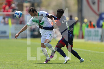 2022-04-16 - Keita Balde of CAGLIARI CALCIO competes for the ball with Gian Marco Ferrari of US SASSUOLO during the Serie A match between Cagliari Calcio and US Sassuolo at Unipol Domus on April 16, 2022 in Cagliari, Italy. - CAGLIARI CALCIO VS US SASSUOLO - ITALIAN SERIE A - SOCCER