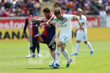 2022-04-16 - Raoul Bellanova of CAGLIARI CALCIO competes for the ball whit Giorgos Kyriakopoulos of US SASSUOLO during the Serie A match between Cagliari Calcio and US Sassuolo at Unipol Domus on April 16, 2022 in Cagliari, Italy. - CAGLIARI CALCIO VS US SASSUOLO - ITALIAN SERIE A - SOCCER
