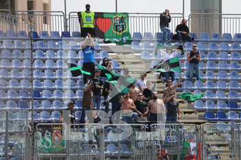 2022-04-16 - Fans of US SASSUOLO during the Serie A match between Cagliari Calcio and US Sassuolo at Unipol Domus on April 16, 2022 in Cagliari, Italy. - CAGLIARI CALCIO VS US SASSUOLO - ITALIAN SERIE A - SOCCER