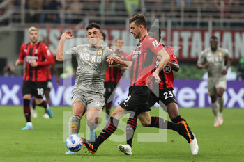 2022-04-15 - Roberto Piccoli of Genoa CFC competes for the ball with Matteo Gabbia of AC Milan during the Serie A 2021/22 football match between AC Milan and Genoa CFC at Giuseppe Meazza Stadium, Milan, Italy on April 15, 2022 - AC MILAN VS GENOA CFC - ITALIAN SERIE A - SOCCER