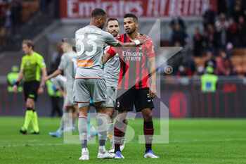 2022-04-15 - Junior Messias of AC Milan and Hernani of Genoa CFC during the Serie A 2021/22 football match between AC Milan and Genoa CFC at Giuseppe Meazza Stadium, Milan, Italy on April 15, 2022 - AC MILAN VS GENOA CFC - ITALIAN SERIE A - SOCCER