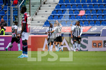 2022-04-24 - Udinese's Destiny Udogie celebrates after scoring a goal 1-1 with teammates - BOLOGNA FC VS UDINESE CALCIO - ITALIAN SERIE A - SOCCER