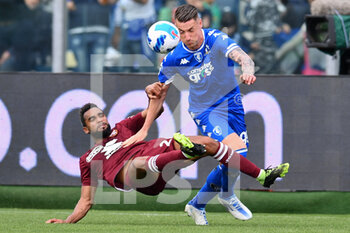 2022-05-01 - Andrea Pinamonti (Empoli FC) and Koffi Djidji (Torino FC) - EMPOLI FC VS TORINO FC - ITALIAN SERIE A - SOCCER