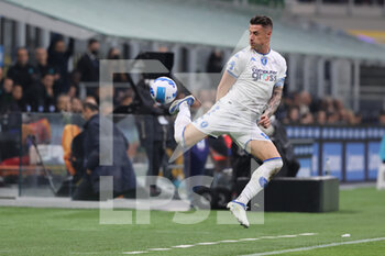 2022-05-06 - Andrea Pinamonti of Empoli FC in action during the Serie A 2021/22 football match between FC Internazionale and Empoli FC at Giuseppe Meazza Stadium, Milan, Italy on May 06, 2022 - INTER - FC INTERNAZIONALE VS EMPOLI FC - ITALIAN SERIE A - SOCCER