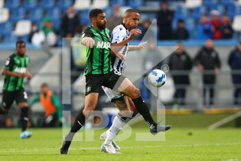 2022-05-07 - Gregoire Defrel of US SASSUOLO competes for the ball with Rodrigo Becao of UDINESE CALCIO during the Serie A match between US Sassuolo and Udinese Calcio at Mapei Stadium-Città del Tricolore on May 7, 2022 in Reggio Emilia, Italy. - US SASSUOLO VS UDINESE CALCIO - ITALIAN SERIE A - SOCCER
