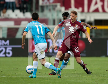 2022-05-07 - Hirving Lozano (Ssc Napoli) and Mergim Vojvoda of Torino Fc during the Italian Serie A, football match between Torino FC and Ssc Napoli, on 07 of May 2022 at Grande Torino stadium in Torino, Italy Italy. Photo Nderim KACELI - TORINO FC VS SSC NAPOLI - ITALIAN SERIE A - SOCCER