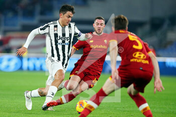2022-01-09 - Paulo Dybala of Juventus (L) in action during the Italian championship Serie A football match between AS Roma and Juventus FC on January 9, 2022 at Stadio Olimpico in Rome, Italy - AS ROMA VS JUVENTUS FC - ITALIAN SERIE A - SOCCER