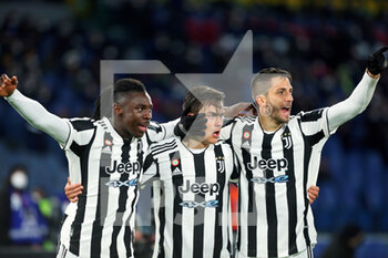 2022-01-09 - Paulo Dybala of Juventus (C) celebrates with Moise Kean (L) and Rodrigo Bentancur (R) after scoring 1-1 goal during the Italian championship Serie A football match between AS Roma and Juventus FC on January 9, 2022 at Stadio Olimpico in Rome, Italy - AS ROMA VS JUVENTUS FC - ITALIAN SERIE A - SOCCER