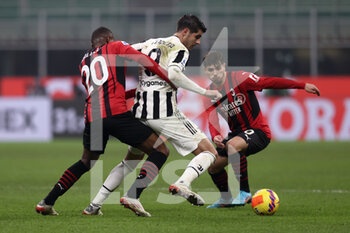 2022-01-23 - Alvaro Morata (Juventus FC) is challenged by Pierre Kalulu (AC Milan) and Brahim Diaz (AC Milan) - AC MILAN VS JUVENTUS FC - ITALIAN SERIE A - SOCCER