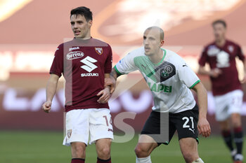 2022-01-23 - Josip Brekalo (Torino FC) and Vlad Chiriches (U.S. Sassuolo) - TORINO FC VS US SASSUOLO - ITALIAN SERIE A - SOCCER