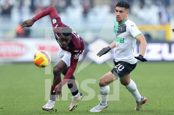 2022-01-23 - Wilfried Singo (Torino FC) and Abderrahman Harroui (U.S. Sassuolo) battle for the ball  - TORINO FC VS US SASSUOLO - ITALIAN SERIE A - SOCCER