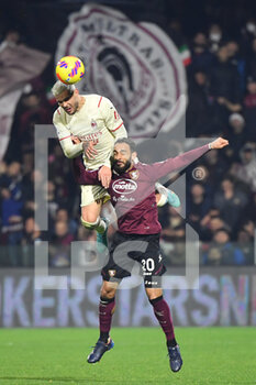 2022-02-19 - Milan's defender Theo Hernandez jump for the ball with Salernitana's midfielder Grigoris Kastanos  - US SALERNITANA VS AC MILAN - ITALIAN SERIE A - SOCCER