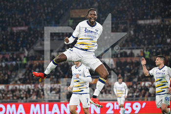 2022-02-19 - Adrien Tameze (Hellas Verona FC) celebrates after scoring the goal 0-2 during the  Italian Football Championship League A 2021/2022 match between AS Roma vs Hellas Verona FC at the Olimpic Stadium in Rome  on 19 February 2021. - AS ROMA VS HELLAS VERONA FC - ITALIAN SERIE A - SOCCER
