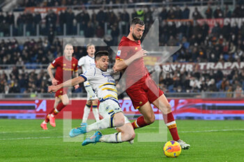 2022-02-19 - Giovanni Simeone (Hellas Verona FC) Bryan Cristante (AS Roma)  during the  Italian Football Championship League A 2021/2022 match between AS Roma vs Hellas Verona FC at the Olimpic Stadium in Rome  on 19 February 2021. - AS ROMA VS HELLAS VERONA FC - ITALIAN SERIE A - SOCCER