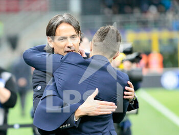 2022-02-20 - Alessio Dionisi, Manager of US Sassuolo and Coach Simone Inzaghi of Inter  during the Italian Serie A football match between FC Inter and Sassuolo Calcio on February 20, 2022 at San Siro - Giuseppe Meazza stadium in Milano , Italy - INTER - FC INTERNAZIONALE VS US SASSUOLO - ITALIAN SERIE A - SOCCER