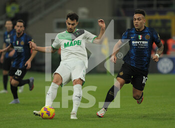 2022-02-20 - Kaan Ayhan of US Sassuolo during the Italian Serie A football match between FC Inter and Sassuolo Calcio on February 20, 2022 at San Siro - Giuseppe Meazza stadium in Milano , Italy - INTER - FC INTERNAZIONALE VS US SASSUOLO - ITALIAN SERIE A - SOCCER
