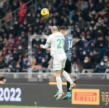 2022-02-20 - Vlad Chiriches of US Sassuolo and Ivan Perisic of Inter  during the Italian Serie A football match between FC Inter and Sassuolo Calcio on February 20, 2022 at San Siro - Giuseppe Meazza stadium in Milano , Italy - INTER - FC INTERNAZIONALE VS US SASSUOLO - ITALIAN SERIE A - SOCCER
