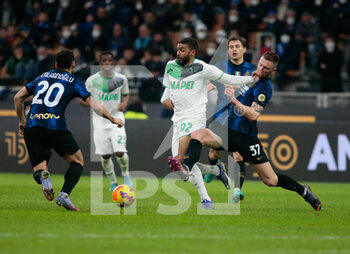 2022-02-20 - Gregoire Defrel of US Sassuolo and Milan Skrinar of Inter  during the Italian Serie A football match between FC Inter and Sassuolo Calcio on February 20, 2022 at San Siro - Giuseppe Meazza stadium in Milano , Italy - INTER - FC INTERNAZIONALE VS US SASSUOLO - ITALIAN SERIE A - SOCCER