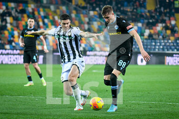 2022-02-20 - Lazio's Toma Basic in action against Udinese's Nehuen Perèz - UDINESE CALCIO VS SS LAZIO - ITALIAN SERIE A - SOCCER