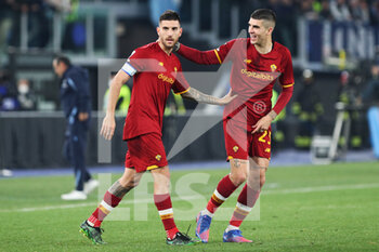 2022-03-20 - Lorenzo Pellegrini of Roma (L) celebrates with Gianluca Mancini (R) after scoring 3-0 goal during the Italian championship Serie A football match between AS Roma and SS Lazio on March 20, 2022 at Stadio Olimpico in Rome, Italy - AS ROMA VS SS LAZIO - ITALIAN SERIE A - SOCCER