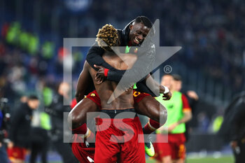 2022-03-20 - Tammy Abraham (L) and Felix Afena-Gyan (R) of Roma celebrate the victory at the end of the Italian championship Serie A football match between AS Roma and SS Lazio on March 20, 2022 at Stadio Olimpico in Rome, Italy - AS ROMA VS SS LAZIO - ITALIAN SERIE A - SOCCER