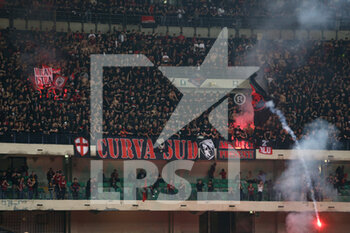 2022-05-08 - AC Milan fans light a smoke bomb - HELLAS VERONA FC VS AC MILAN - ITALIAN SERIE A - SOCCER