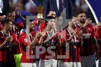 2022-05-22 - Alessandro Florenzi (AC Milan), Sandro Tonali (AC Milan) and Davide Calabria (AC Milan) celebrates after winning the Serie A championship title - US SASSUOLO VS AC MILAN - ITALIAN SERIE A - SOCCER