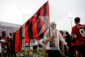 2022-05-22 - AC Milan fan celebrates with a red and black flag - US SASSUOLO VS AC MILAN - ITALIAN SERIE A - SOCCER