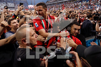 2022-05-22 - Ismael Bennacer (AC Milan) and Rafael Leao (AC Milan) celebrate with the fans after winning the Serie A championship title - US SASSUOLO VS AC MILAN - ITALIAN SERIE A - SOCCER
