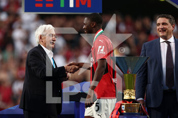 2022-05-22 - Fode Ballo-Toure (AC Milan) is awarded with the medal after winning the Serie A championship title - US SASSUOLO VS AC MILAN - ITALIAN SERIE A - SOCCER