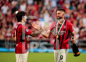 2022-05-22 - Oliver Giroud (Ac Milan) and Sandro Tonali (Ac Milan) during the Italian championship Serie A football match between US Sassuolo and AC Milan on May 22, 2022 at Mapei Stadium-Città del Tricolore in Reggio Emilia, Italy - US SASSUOLO VS AC MILAN - ITALIAN SERIE A - SOCCER