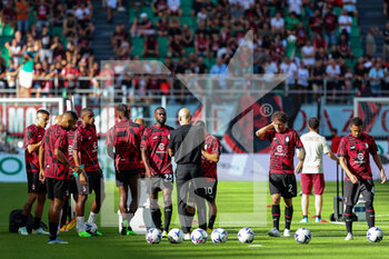 2022-08-13 - AC Milan players warm up during the Serie A 2022/23 football match between AC Milan and Udinese Calcio at Giuseppe Meazza Stadium, Milan, Italy on August 13, 2022 - AC MILAN VS UDINESE CALCIO - ITALIAN SERIE A - SOCCER