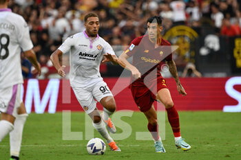2022-08-22 - Roger Ibanez (AS Roma) Cyriel Dessers (US Cremonese)  during the Italian Football Championship League A 2022/2023 match between AS Roma vs US Cremonese at the Olimpic Stadium in Rome  on 22 August 2022. - AS ROMA VS US CREMONESE - ITALIAN SERIE A - SOCCER