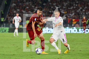 2022-08-22 - Stephan El Shaarawy (AS Roma) Santiago Ascacibar (US Cremonese)  during the Italian Football Championship League A 2022/2023 match between AS Roma vs US Cremonese at the Olimpic Stadium in Rome  on 22 August 2022. - AS ROMA VS US CREMONESE - ITALIAN SERIE A - SOCCER