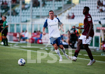 2022-08-20 - Adam Marusic of Ss Lazio and Stephane Singo of Torino Fc during the Italian Serie A football match between Torino Fc and Ss Lazio, on August 20, 2022 at Stadio Olimpico Grande Torino in Turin, Italy. Photo Nderim Kaceli - TORINO FC VS SS LAZIO - ITALIAN SERIE A - SOCCER