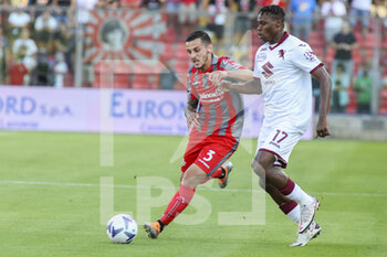 2022-08-27 - Emanuele Valeri of US Cremonese  battle for the ball with Wilfried Stephane Singo of Torino FC during US Cremonese vs Torino FC, 3° Serie A Tim 2022-23 game at Giovanni Zini Stadium in Cremona (CR), Italy, on August 27, 2022. - US CREMONESE VS TORINO FC - ITALIAN SERIE A - SOCCER