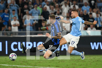 2022-08-26 - Ciro Immobile (SS Lazio) Milan Skriniar (FC Inter)  during the Italian Football Championship League A 2022/2023 match between SS Lazio vs Inter - FC Internazionale at the Olimpic Stadium in Rome on 26 August 2022. - SS LAZIO VS INTER - FC INTERNAZIONALE - ITALIAN SERIE A - SOCCER