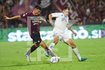 2022-09-05 - Liam Henderson of Empoli FC  and Flavius Daniliuc of US Salernitana competes for the ball with  during the Serie A match between US Salernitana 1919 and FC Empoli  at Stadio Arechi   - US SALERNITANA VS EMPOLI FC - ITALIAN SERIE A - SOCCER