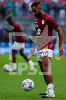 2022-09-10 - Koffi Djidji of Torino FC warms up during the Serie A 2022/23 football match between FC Internazionale and Torino FC at Giuseppe Meazza Stadium, Milan, Italy on September 10, 2022 - INTER - FC INTERNAZIONALE VS TORINO FC - ITALIAN SERIE A - SOCCER