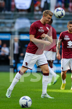 2022-09-10 - Perr Schuurs of Torino FC warms up during the Serie A 2022/23 football match between FC Internazionale and Torino FC at Giuseppe Meazza Stadium, Milan, Italy on September 10, 2022 - INTER - FC INTERNAZIONALE VS TORINO FC - ITALIAN SERIE A - SOCCER