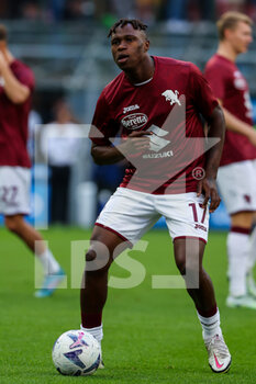 2022-09-10 - Wilfried Singo of Torino FC warms up during the Serie A 2022/23 football match between FC Internazionale and Torino FC at Giuseppe Meazza Stadium, Milan, Italy on September 10, 2022 - INTER - FC INTERNAZIONALE VS TORINO FC - ITALIAN SERIE A - SOCCER