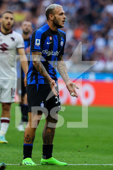 2022-09-10 - Federico Dimarco of FC Internazionale reacts during the Serie A 2022/23 football match between FC Internazionale and Torino FC at Giuseppe Meazza Stadium, Milan, Italy on September 10, 2022 - INTER - FC INTERNAZIONALE VS TORINO FC - ITALIAN SERIE A - SOCCER