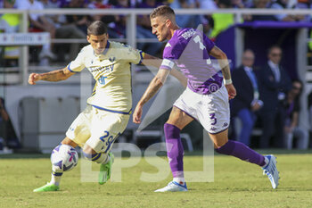 2022-09-18 - Fabio Depaoli of Hellas Verona FC competes for the ball with Cristiano Biraghi of ACF Fiorentina during ACF Fiorentina vs Hellas Verona, 7° Serie A Tim 2022-23 game at Artemio Franchi Stadium in Firenze (FI), Italy, on September 18, 2022. - ACF FIORENTINA VS HELLAS VERONA - ITALIAN SERIE A - SOCCER