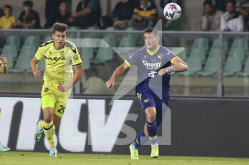 2022-10-03 - Jaka Bijol of Udinese FC  and Thomas Henry of Hellas Verona competes for the ball during Hellas Verona vs Udinese FC, 8° Serie A Tim 2022-23 game at Marcantonio Bentegodi Stadium in Verona, Italy, on October 03, 2022. - HELLAS VERONA FC VS UDINESE CALCIO - ITALIAN SERIE A - SOCCER
