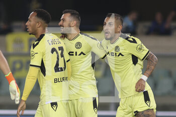 2022-10-03 - Enzo Ebosse of Udinese FC, Roberto Pereyra of Udinese FC and Tolgay Arslan of Udinese FC  celebrate the victory at the end of Hellas Verona vs Udinese FC, 8° Serie A Tim 2022-23 game at Marcantonio Bentegodi Stadium in Verona, Italy, on October 03, 2022. - HELLAS VERONA FC VS UDINESE CALCIO - ITALIAN SERIE A - SOCCER