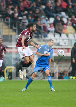2022-10-09 - Ricardo Rodriguez of Torino Fc and Nedim Bajrami of Empoli Fc during the Italian Serie a, football match between Torino Fc and Empoli Fc, on 09 October 2022, at Stadio Grande Torino, Turin, Italy. Photo Nderim Kaceli - TORINO FC VS EMPOLI FC - ITALIAN SERIE A - SOCCER